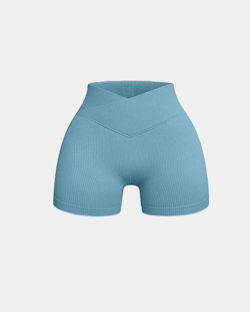 Shorts deportivos de yoga ajustados de cintura alta y canalé en color sólido