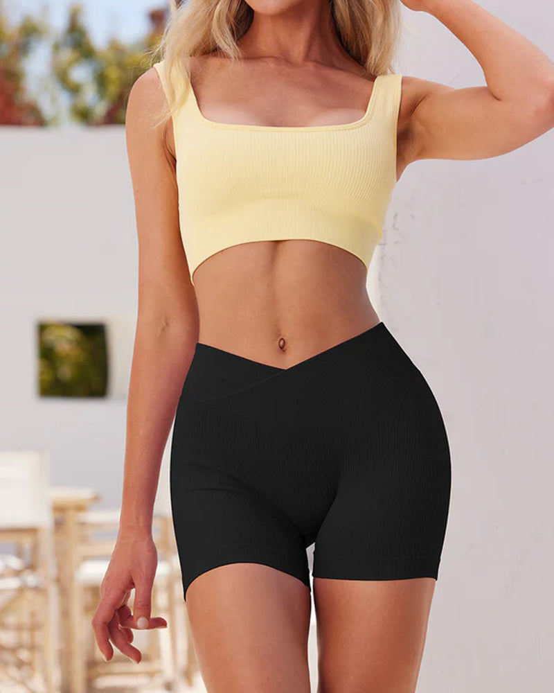 Shorts deportivos de yoga ajustados de cintura alta y canalé en color sólido