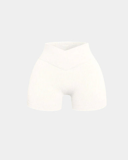Shorts deportivos de yoga ajustados de cintura alta y canalé en color sólido