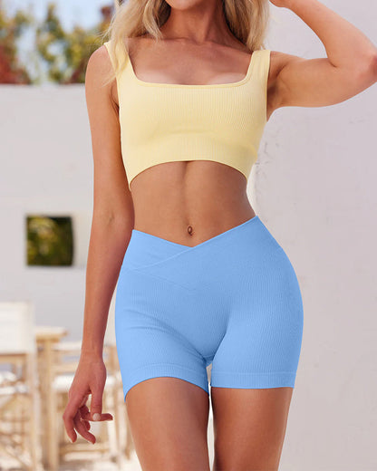 Shorts deportivos de yoga ajustados de cintura alta y canalé en color sólido