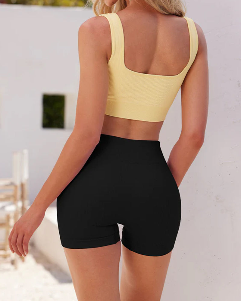 Shorts deportivos de yoga ajustados de cintura alta y canalé en color sólido
