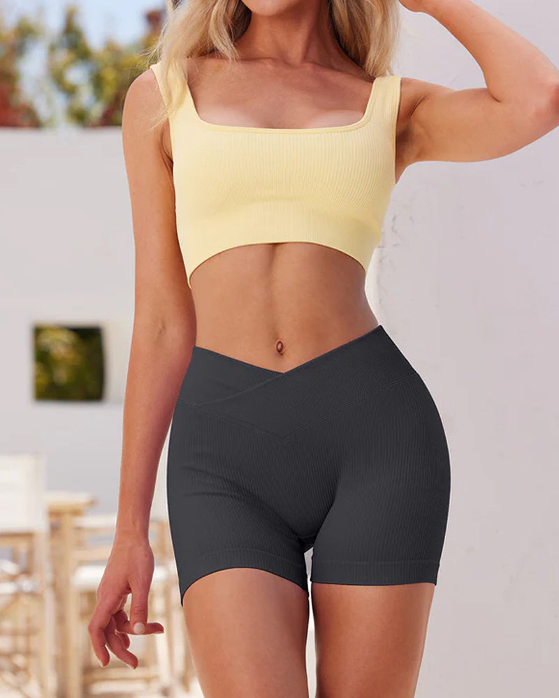Shorts deportivos de yoga ajustados de cintura alta y canalé en color sólido
