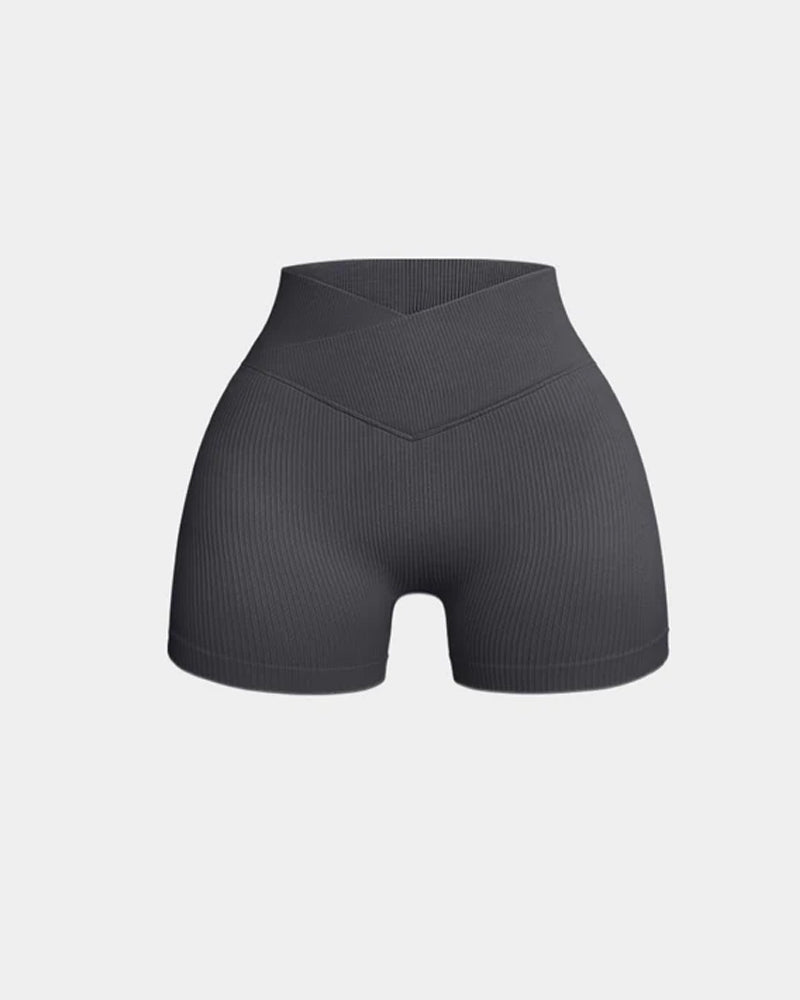 Shorts deportivos de yoga ajustados de cintura alta y canalé en color sólido