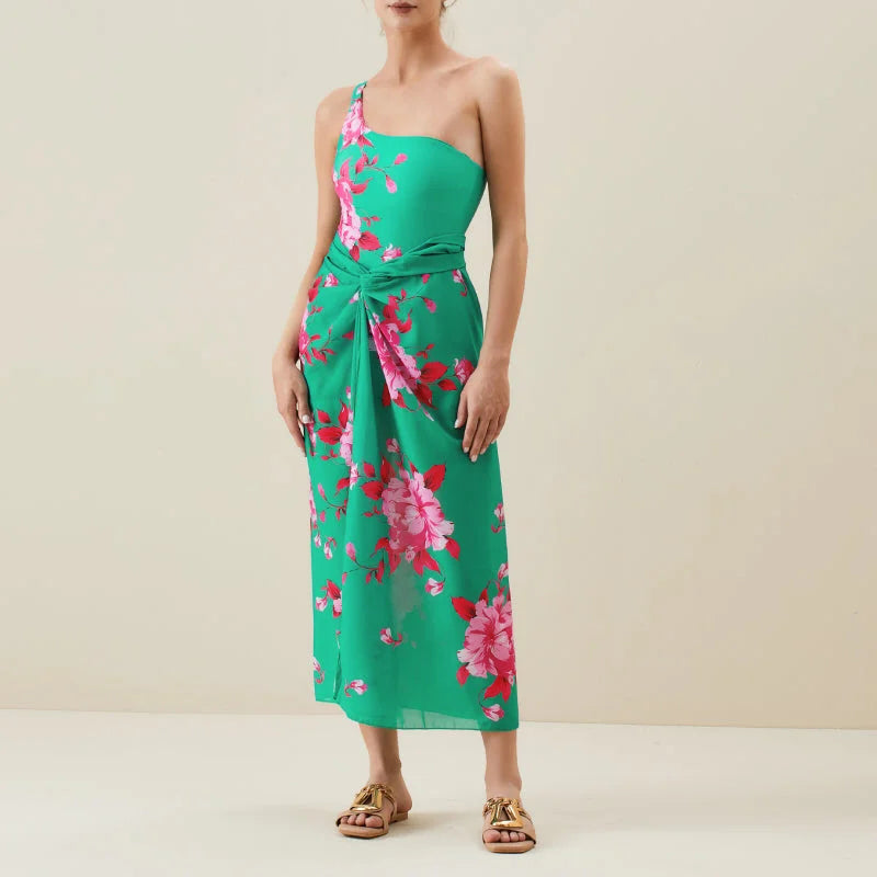 A one-sleeve floral print swimsuit with a sarong