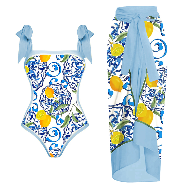 One-piece swimsuit with bow straps and lemon print sarong