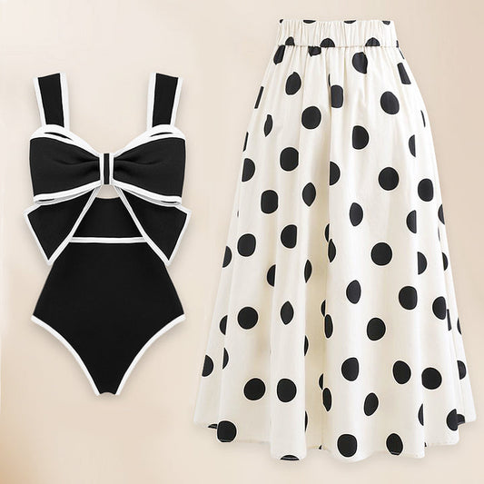 Bañador de una pieza y falda con decoración de lazo en blanco y negro