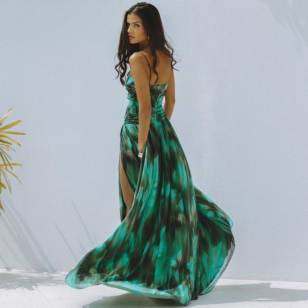 One-piece swimsuit with green printed pleats and skirt