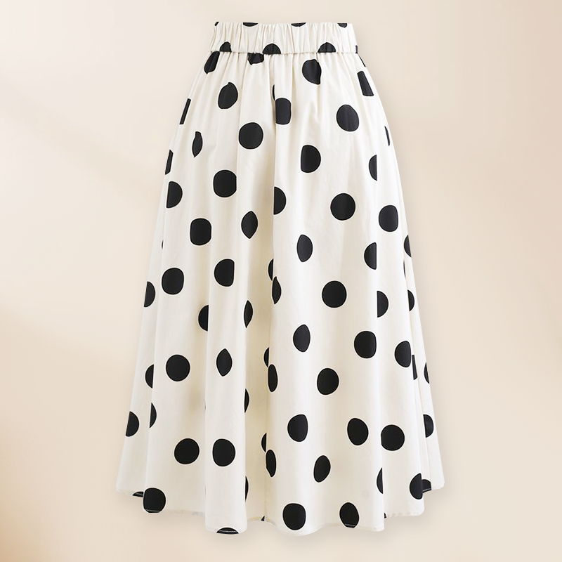 One-piece swimsuit and skirt with black and white bow decoration