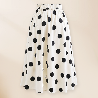 Bañador de una pieza y falda con decoración de lazo en blanco y negro