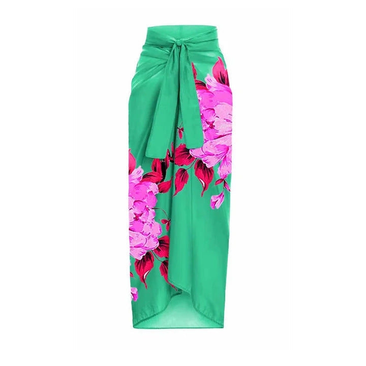 A one-sleeve floral print swimsuit with a sarong