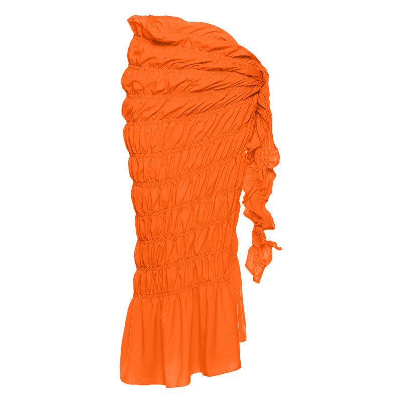 An orange one-sleeve ruffled swimsuit with a sarong