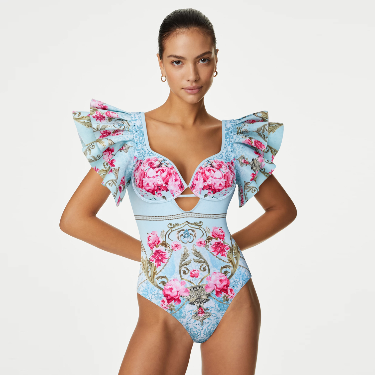 One-piece swimsuit with a curly blue floral print and skirt