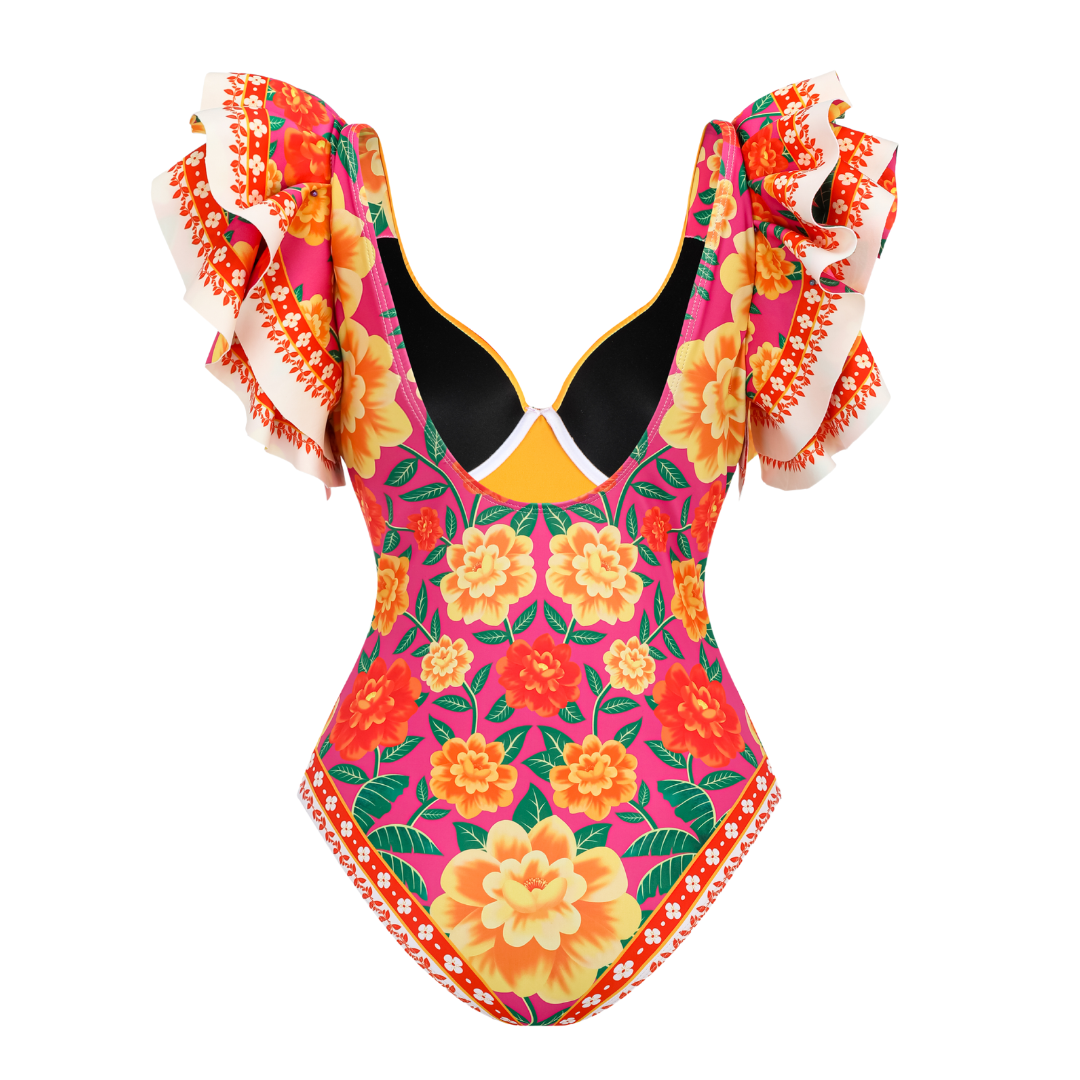 One-piece swimsuit with contrast print and ruffled sarong