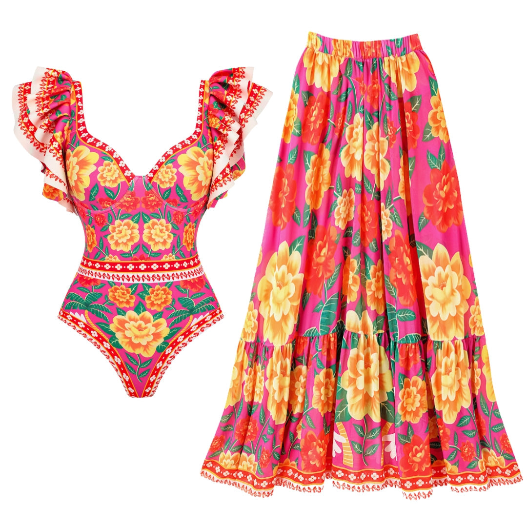 One-piece swimsuit with contrast print and ruffled sarong