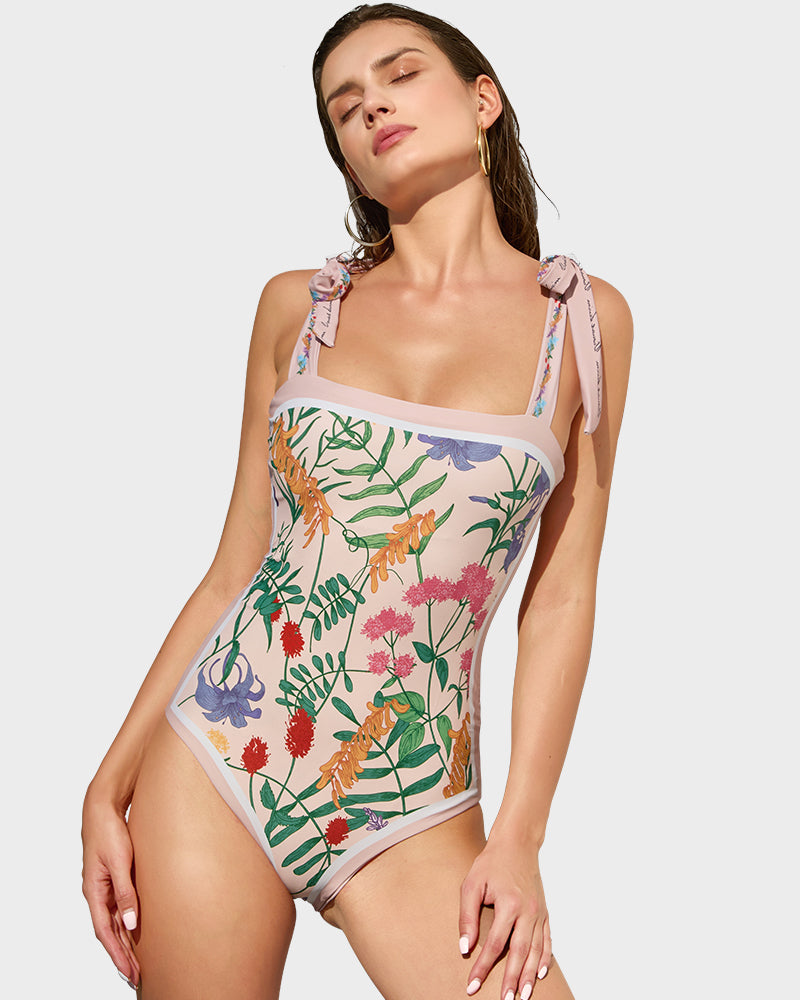 Traje de baño de una pieza floral reversible con tirantes ajustables